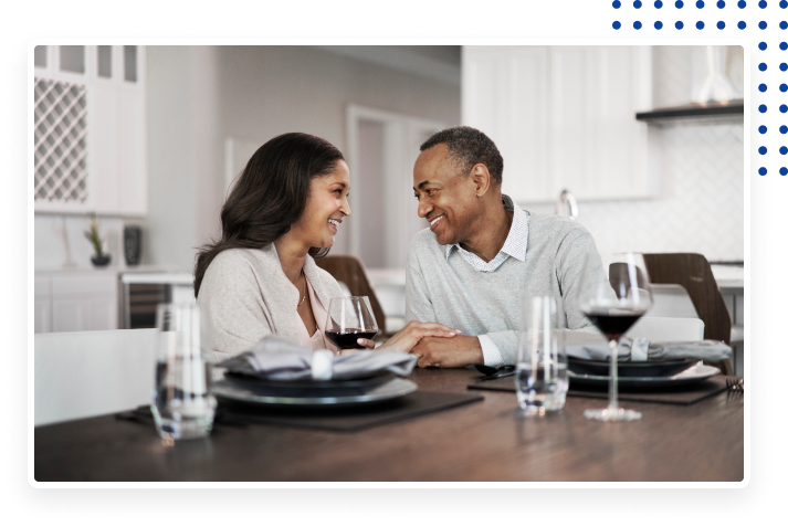 Couple enjoying dinner in their home